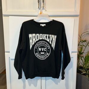 Brooklyn Adult Sweater Size M Black Long Sleeves Embossed Graphic
